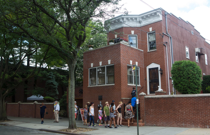 Visitors enter the Louis Armstrong House Museum